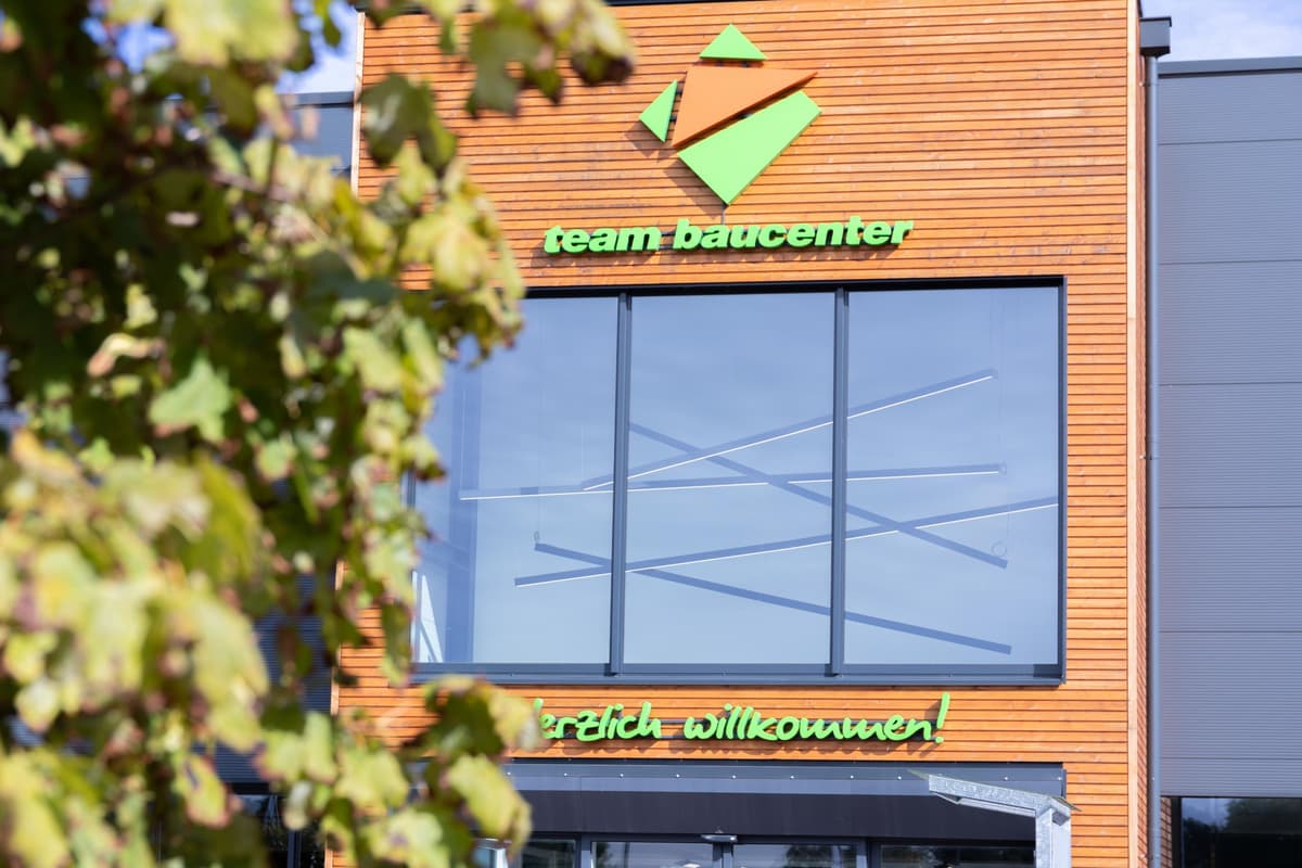 The entrance of a store in Germany, branded with the team logo.